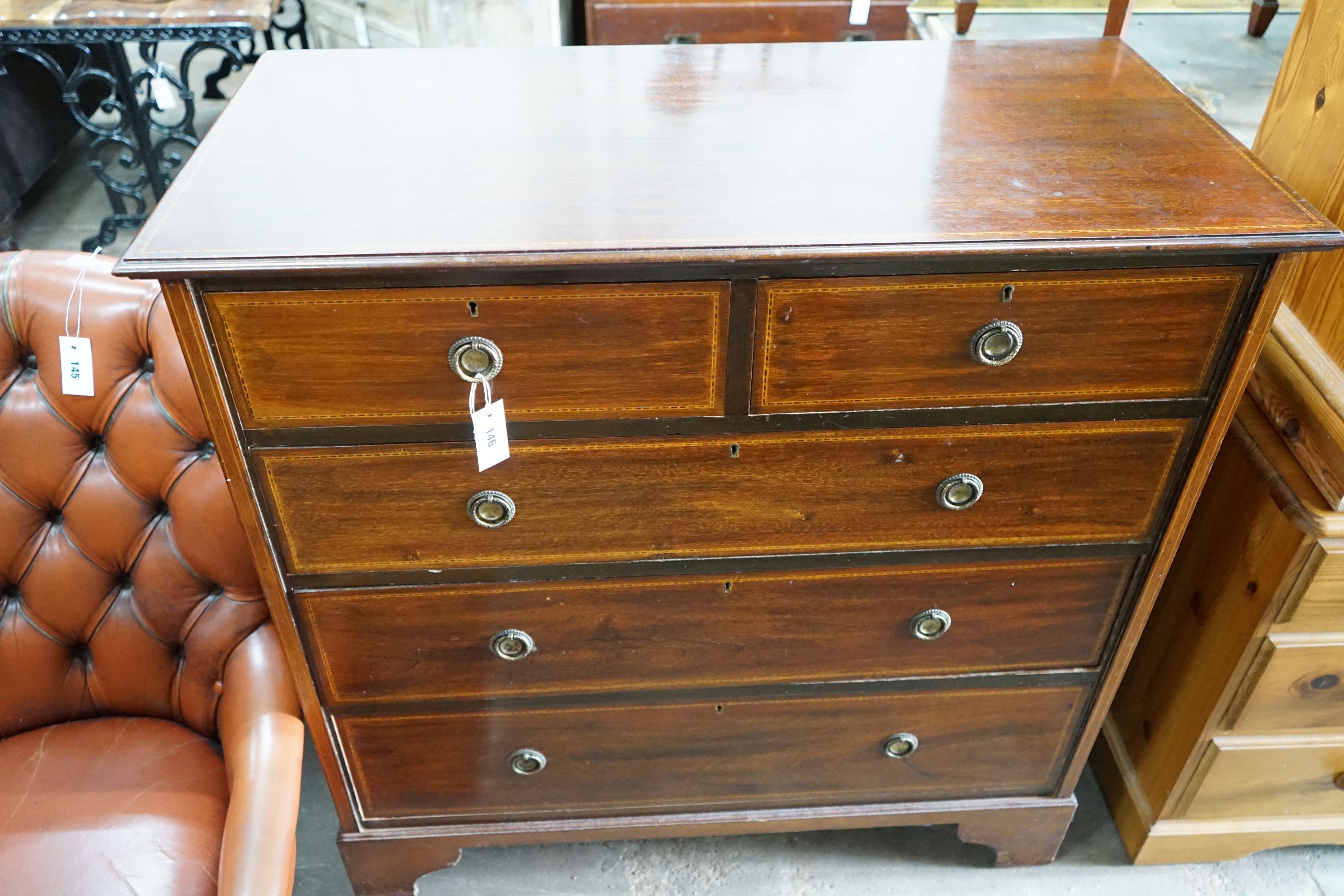 An Edwardian inlaid mahogany chest, fitted two short and three long drawers, width 106cm, depth 52cm, height 107cm